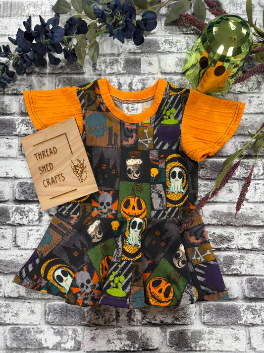 Spooky Peplum Top